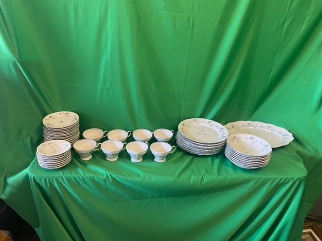 A table with plates and bowls on it